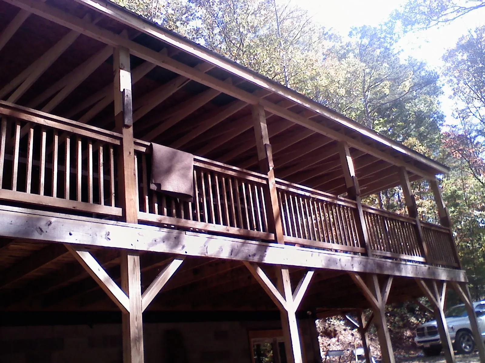 Timber framing under a new elevated porch and deck — Roof Leak Repair in Kennebunk by Roofing Brothers